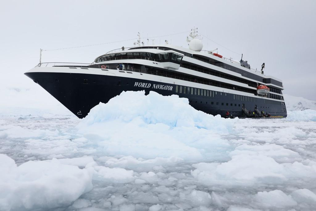 Atlas World Navigator Cruise ship sailing amongst icebergs